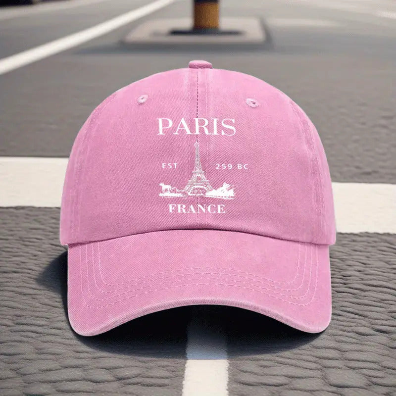 A Retro Baseball Cap Featuring a Print of The Eiffel Tower in Paris, Designed with a Relaxed Curved Brim And Soft Top, Adjustable for a Comfortable Fit, Perfect for Sports, And Stylish with a Pointed Top