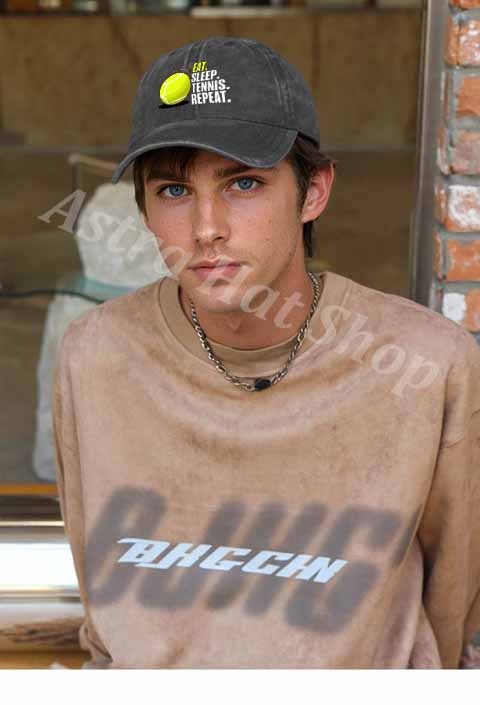 A Sporty Baseball Cap Featuring a Tennis Design That Showcases Enthusiasm, Perfect for Outdoor Activities